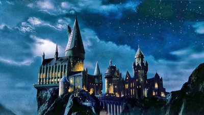 Harry Potter Adventure HD Wallpaper of a Magical Castle and Witch in Fantasy Series