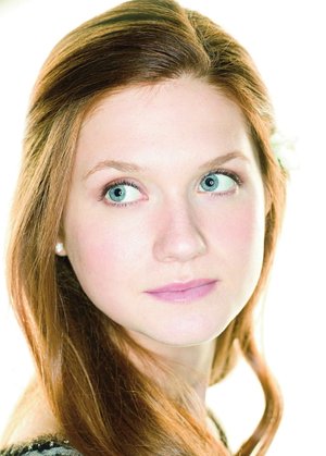 Bonnie Wright HD Wallpaper featuring BlueEyed Harry Potter Actress with Long Blonde Hair and Stunning Beauty