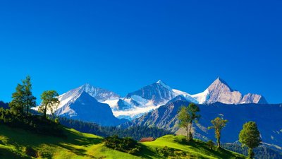 Swiss Alps Landscape HD Wallpaper with Majestic Mountains and Blue Sky