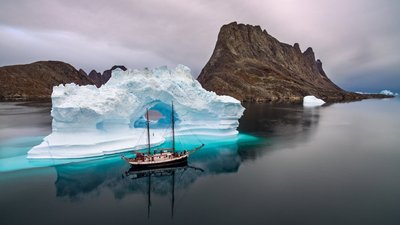 White Sail Ship Beside Iceberg HD Wallpaper for Nature and Landscape Enthusiasts