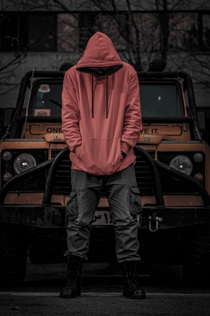 Vibrant Red Hoodie Jeep OffRoad Adventure Background